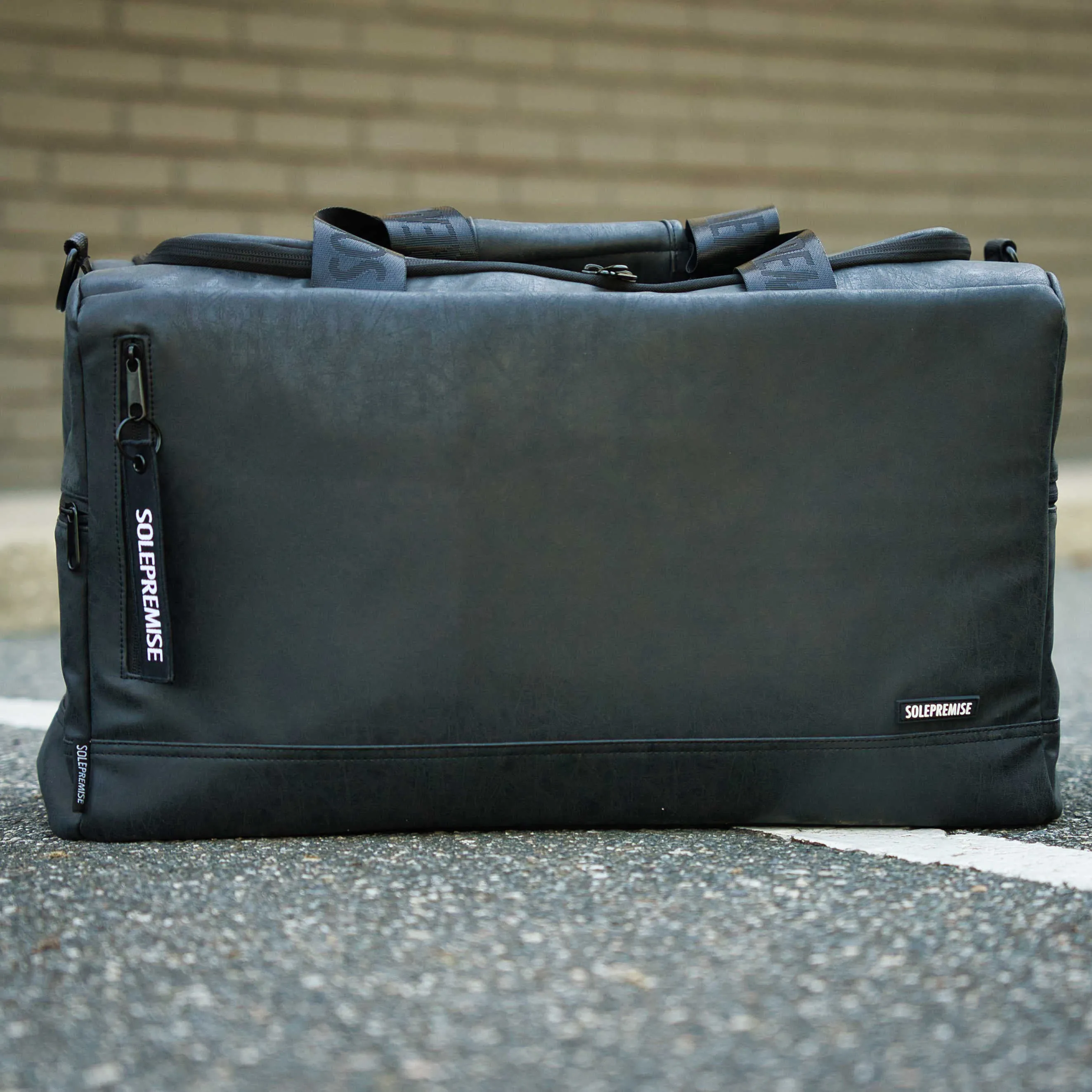 Black Leather Sneaker Duffle Bag