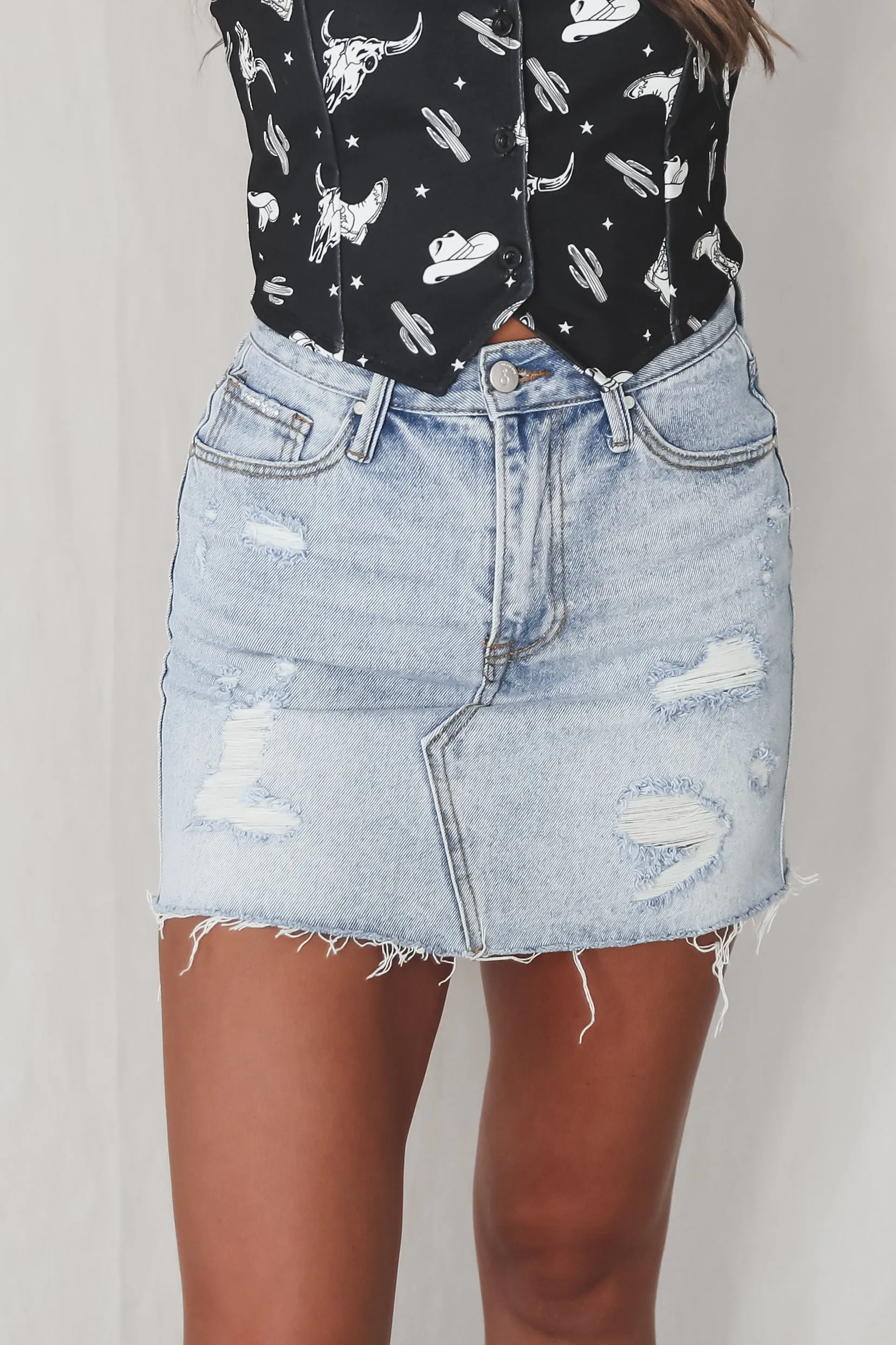 Cooler Than The Average Denim Distressed Mini Skirt