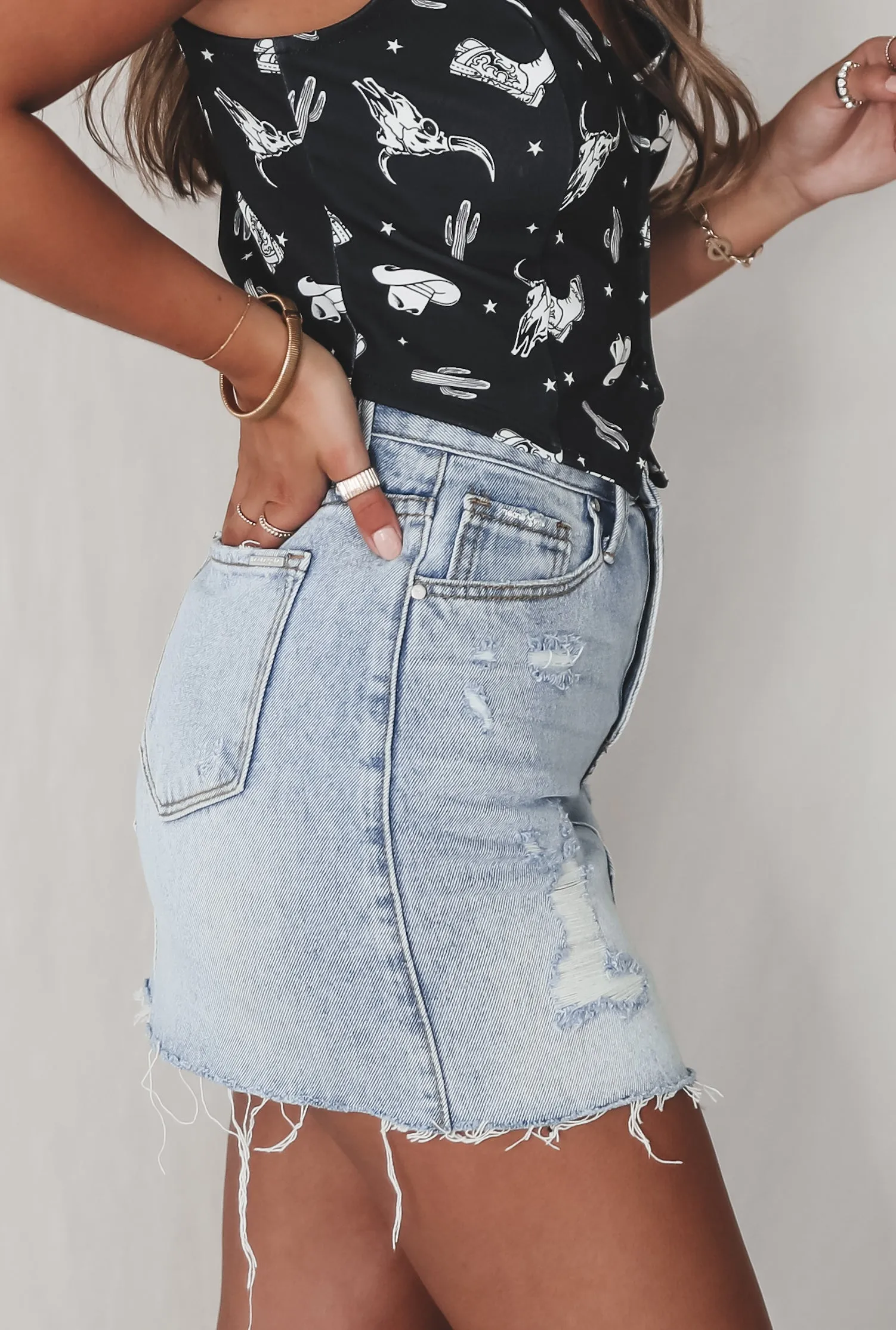 Cooler Than The Average Denim Distressed Mini Skirt